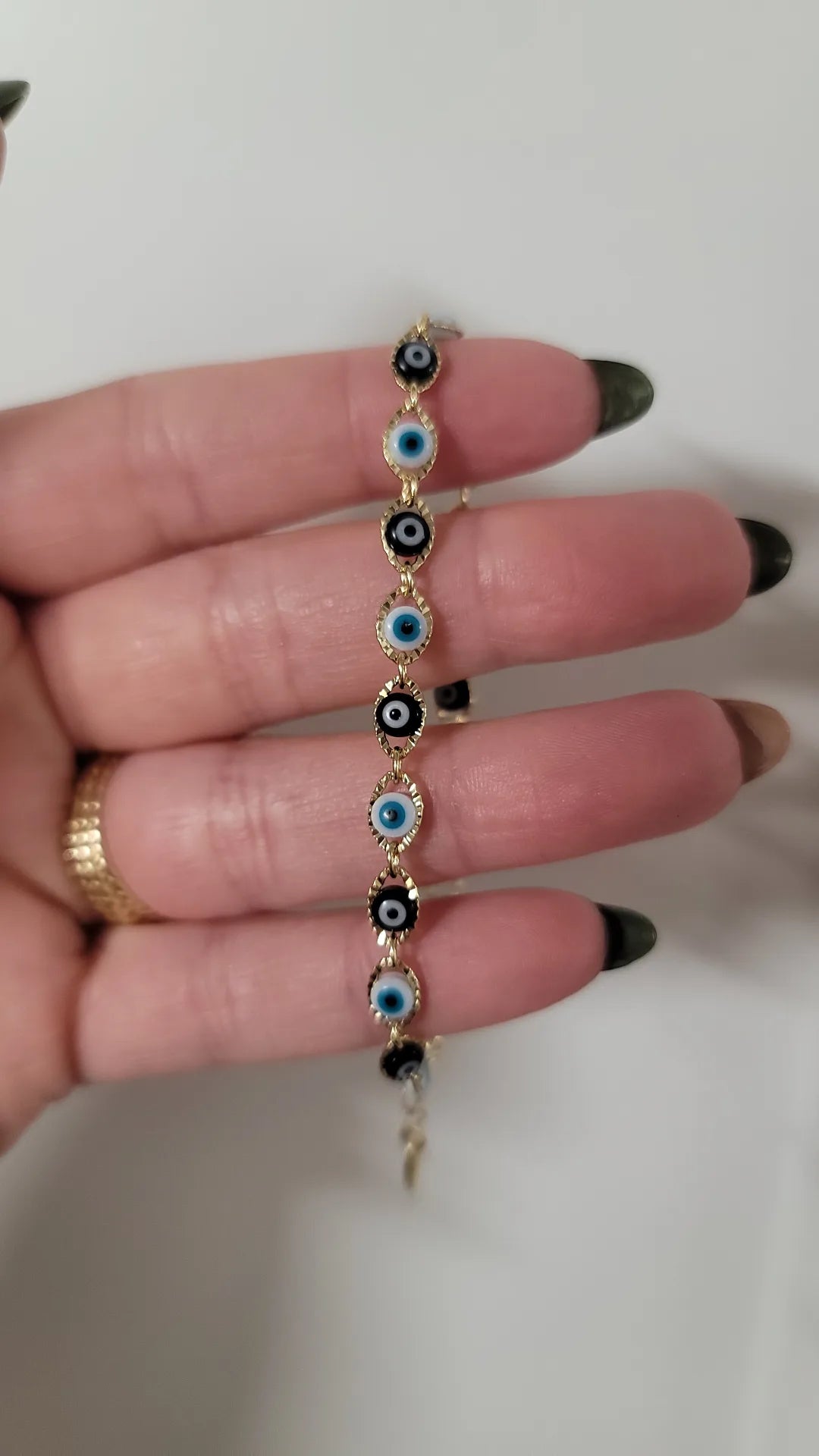 PULSERA DE OJITOS