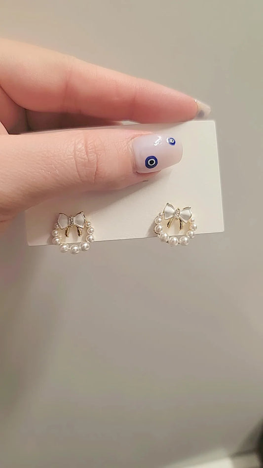 ARETES DE PERLA CON LAZO